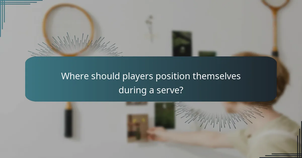 Where should players position themselves during a serve?
